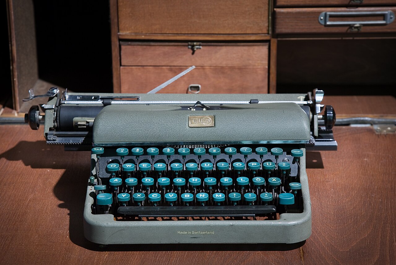 A vintage typewriter photographed in Vienna, showing a classic portable form.
