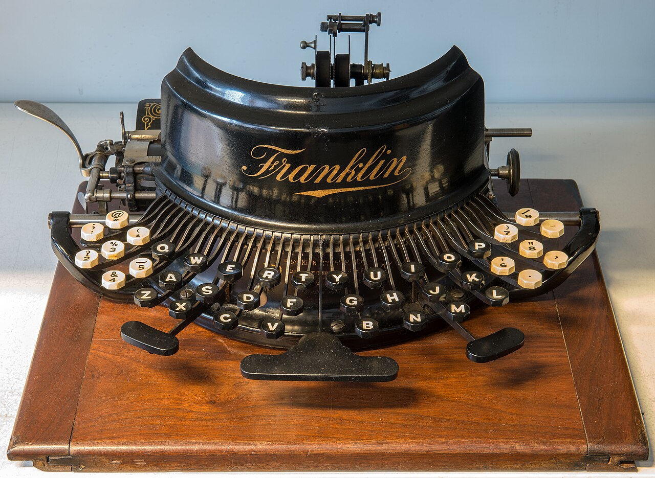 A typewriter shown in three-quarter view, illustrating a well-documented machine.